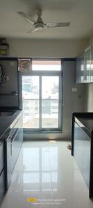 Kitchen Image of 925 Sq.ft 2 BHK Apartment / Flat for sale in Jiten Apartment, Andheri West Mumbai for Rs. 25000000
