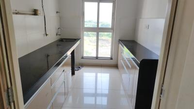 Kitchen Image of 800 Sq.ft 2 BHK Apartment / Flat for rent in Godrej Emerald, Thane West Thane for Rs. 28000