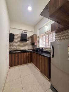 Kitchen Image of 1200 Sq.ft 1 BHK Apartment / Flat for rent in Domlur Layout Bengaluru for Rs. 55000