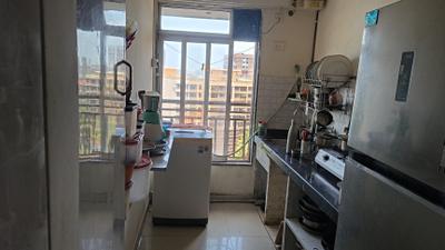 Kitchen Image of 970 Sq.ft 2 BHK Apartment / Flat for sale in Arihant Residency, Sion Mumbai for Rs. 28000000