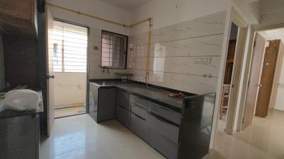 Kitchen Image of 1011 Sq.ft 2 BHK Apartment / Flat for rent in Green Paradise, Dahin Nagar Surat for Rs. 15000