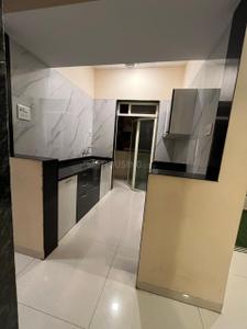 Kitchen Image of 730 Sq.ft 1 BHK Apartment / Flat for sale in Mohan Precious Greens, Ambernath East Ambernath for Rs. 3500000