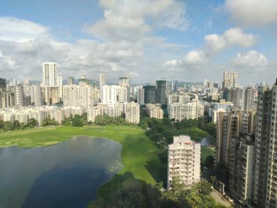 Living Room Image of 900 Sq.ft 2 BHK Apartment / Flat for sale in Gurukrupa Marina Enclave, Malad West Mumbai for Rs. 16000000