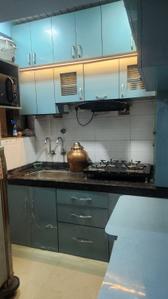 Kitchen Image of 700 Sq.ft 2 BHK Apartment / Flat for rent in Crystal Panvelkar Aangan, Vasind Thane for Rs. 15000