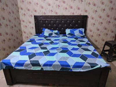 Bedroom Image of 400 Sq.ft 1 RK Builder Floor for rent in Dwarka Mor New Delhi for Rs. 9000