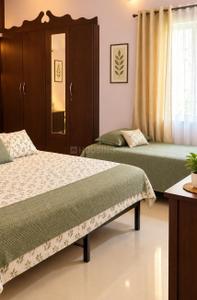 Bedroom Image of 1000 Sq.ft 2 BHK Builder Floor for rent in Palarivattom Kochi for Rs. 25000
