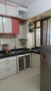 Kitchen Image of 850 Sq.ft 2 BHK Apartment / Flat for rent in Sandhya Co Operative Housing Society Limited, Kopar Khairane Navi Mumbai for Rs. 45000