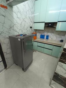 Kitchen Image of 950 Sq.ft 2 BHK Builder Floor for rent in Ramesh Nagar New Delhi for Rs. 28000