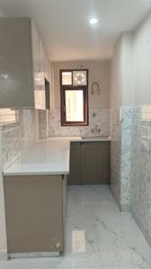 Kitchen Image of 720 Sq.ft 2 BHK Apartment / Flat for rent in ATFL JVTS Gardens, Chhattarpur New Delhi for Rs. 25000