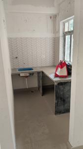 Kitchen Image of 550 Sq.ft 2 BHK Apartment / Flat for sale in Realmark Kabyo Neer, Harinavi Kolkata for Rs. 3500000