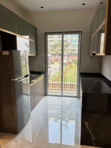 Kitchen Image of 900 Sq.ft 2 BHK Builder Floor for sale in JSB Nakshatra Veda, Vasai East Vasai for Rs. 6200000
