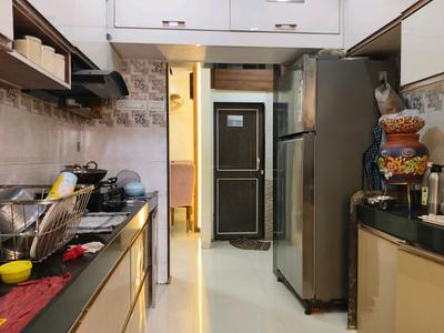 Kitchen Image of 950 Sq.ft 2 BHK Apartment / Flat for rent in Vivaan Yashodarshan Residency, Kalyan East Kalyan for Rs. 23000