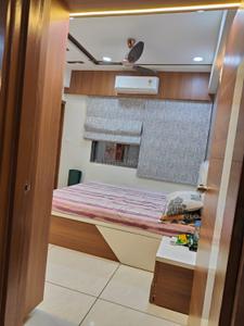 Bedroom Image of 1200 Sq.ft 2 BHK Apartment / Flat for rent in Bhadaj Ahmedabad for Rs. 34000
