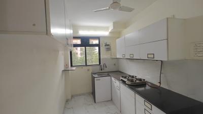 Kitchen Image of 900 Sq.ft 2 BHK Apartment / Flat for sale in Hiranandani Estate Thane for Rs. 14500000