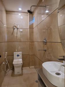 Common Bathroom Image of 1100 Sq.ft 3 BHK Apartment / Flat for sale in PNM Affordable Floors, Hastsal New Delhi for Rs. 7500000