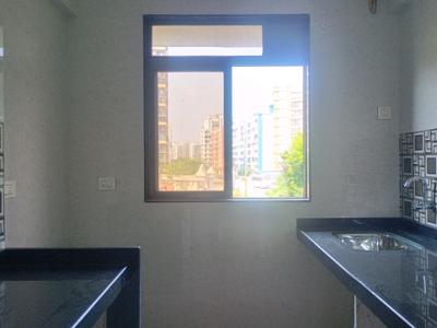 Kitchen Image of 630 Sq.ft 1 BHK Apartment / Flat for sale in Paradise Sai World Dreams, Dombivli East Thane for Rs. 4790000