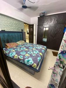 Bedroom Image of 672 Sq.ft 2 BHK Apartment / Flat for sale in Dharmesh Om Sai Tower, Dahisar West Mumbai for Rs. 13500000