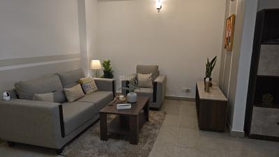 Living Room Image of 1260 Sq.ft 2 BHK Apartment / Flat for sale in Bulland Heights, Crossings Republik Ghaziabad for Rs. 7800000
