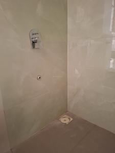 Common Bathroom Image of 670 Sq.ft 1 BHK Apartment / Flat for sale in Aaron Kanupriya, Kamothe Navi Mumbai for Rs. 6700000