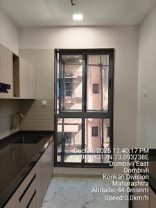 Kitchen Image of 695 Sq.ft 2 BHK Apartment / Flat for sale in Nirman Milan Dham, Dombivli East Thane for Rs. 6000000