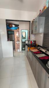 Kitchen Image of 650 Sq.ft 1 BHK Apartment / Flat for sale in Charms City A12, Titwala Thane for Rs. 3400000