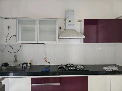 Kitchen Image of 715 Sq.ft 1 BHK Apartment / Flat for rent in Pride World City, Charholi Budruk Pune for Rs. 22000