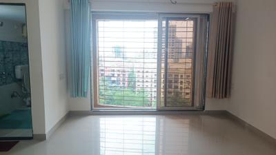 Living Room Image of 612 Sq.ft 2 BHK Apartment / Flat for sale in Gagangiri Complex, Dahisar West Mumbai for Rs. 17500000