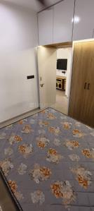 Bedroom Image of 780 Sq.ft 1 BHK Apartment / Flat for rent in Applewoods Satyesh Residency, Shela Ahmedabad for Rs. 18000