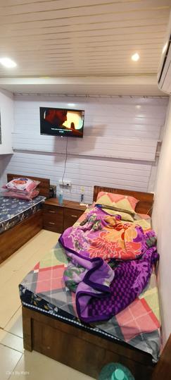 Bedroom Image of Bhagwati PG in Andheri West, Mumbai