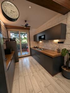 Kitchen Image of 6000 Sq.ft 6 BHK Independent House for sale in Brookside The Well Being Habitat, Parshwapuram Lonavala for Rs. 60000000