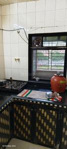 Kitchen Image of 875 Sq.ft 2 BHK Apartment / Flat for sale in Ulhasnagar Thane for Rs. 2600000