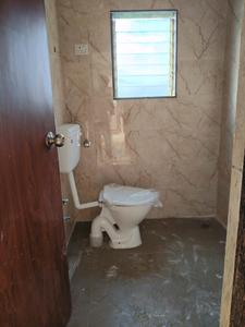 Common Bathroom Image of 706 Sq.ft 1 BHK Apartment / Flat for sale in Pushpak Nagar Navi Mumbai for Rs. 4350000