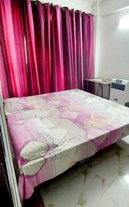 Bedroom Image of Home PG  in Omega II Greater Noida, Greater Noida