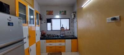 Kitchen Image of 900 Sq.ft 2 BHK Apartment / Flat for rent in Sai Raj Residency, Pimple Gurav Pune for Rs. 28000