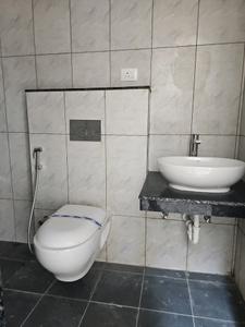Common Bathroom Image of 910 Sq.ft 2 BHK Apartment / Flat for sale in Upper Kharadi Pune for Rs. 14000000