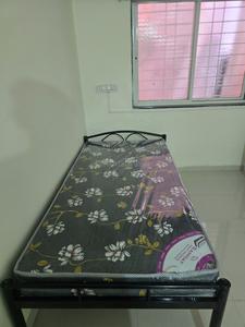 Bedroom Image of Ram Krishna Hari PG in Wagholi, Pune