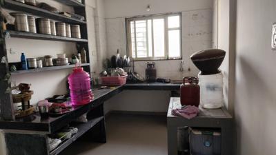 Kitchen Image of 870 Sq.ft 2 BHK Apartment / Flat for sale in Nayan Mountscape, Pisoli Pune for Rs. 4200000