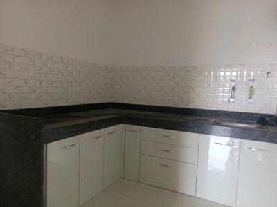 Kitchen Image of 1000 Sq.ft 2 BHK Apartment / Flat for sale in Majestique Rhythm County, Handewadi Pune for Rs. 5700000
