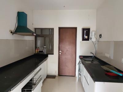 Kitchen Image of 950 Sq.ft 2 BHK Apartment / Flat for rent in Skyi Songbirds , Bhugaon Pune for Rs. 25000