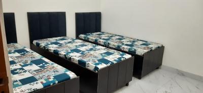 Bedroom Image of friends pg in Sector 15, Noida