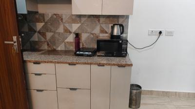 Kitchen Image of 700 Sq.ft 1 BHK Builder Floor for rent in Sector 54 Gurgaon for Rs. 64000