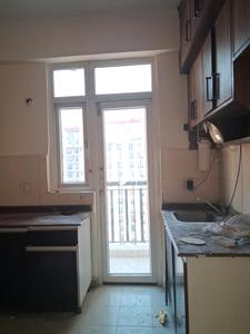 Kitchen Image of 1325 Sq.ft 3 BHK Apartment / Flat for sale in Amrapali Zodiac, Sector 120 Noida for Rs. 12000000