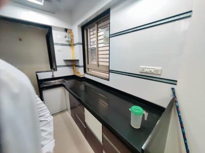 Kitchen Image of 666 Sq.ft 1 BHK Apartment / Flat for rent in Kalp Capitol Flora And Capitol Icon, Sargasan Gandhinagar for Rs. 20500