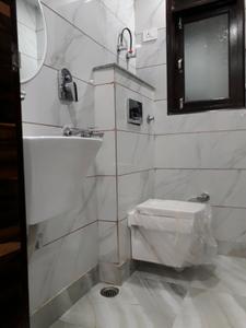 Common Bathroom Image of 550 Sq.ft 2 BHK Apartment / Flat for sale in Dwarka Mor New Delhi for Rs. 2700000