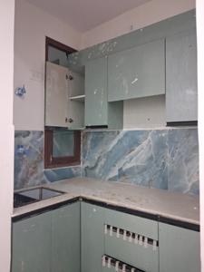 Kitchen Image of 1050 Sq.ft 2 BHK Apartment / Flat for sale in Sector 49 Noida for Rs. 4200000