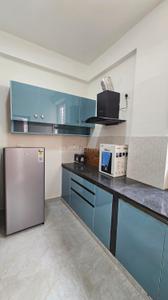 Kitchen Image of 1100 Sq.ft 1 BHK Apartment / Flat for rent in Domlur Layout Bengaluru for Rs. 42000