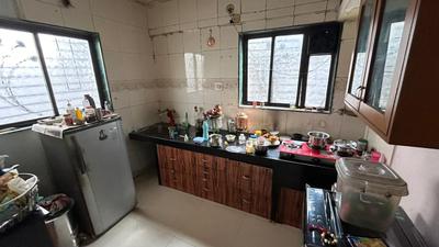 Kitchen Image of 620 Sq.ft 1 BHK Apartment / Flat for sale in Siddhalaxmi Complex, Akurdi Pune for Rs. 3800000