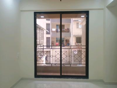 Living Room Image of 850 Sq.ft 2 BHK Apartment / Flat for sale in Tharwani Vedant Millenia Happiness Phase II Wing B, Titwala Thane for Rs. 4500000