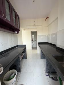 Kitchen Image of 695 Sq.ft 2 BHK Apartment / Flat for rent in Runwal Gardens, Dombivli East Thane for Rs. 18000