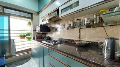 Kitchen Image of 1075 Sq.ft 2 BHK Apartment / Flat for sale in Neelkanth Luxuria, Taloja Navi Mumbai for Rs. 6300000